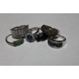 Six silver dress rings