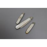 Three silver and mother of pearl fruit knives