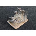 A tray of crystal, Mary Gregory style vases, decanters,