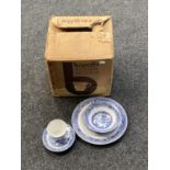A boxed set of Barretts Staffordshire blue and white willow pattern china