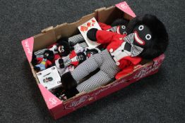 A box of golly bandsmen and soft toys