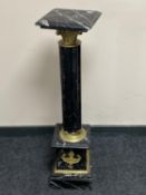 An ormolu mounted black marble plant stand