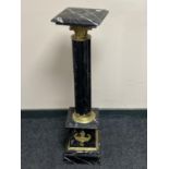 An ormolu mounted black marble plant stand