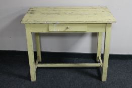 An antique painted pine table