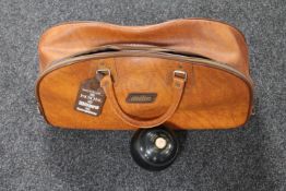 A vintage Mitre holdall containing bowling balls