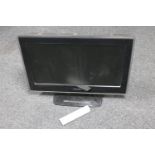 A Toshiba 26" LCD TV with remote