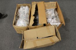 New stock : Four boxes of silver zip trousers and silver strap tops,