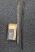 A draughtsman's ruler and a brass plaque