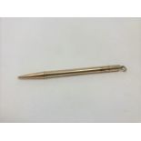 A 9ct gold propelling pencil, 8.9g.