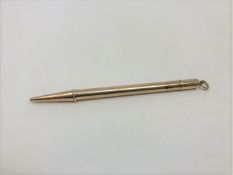 A 9ct gold propelling pencil, 8.9g.