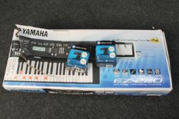 A Yamaha EZ 220 keyboard and two HD HP webcams
