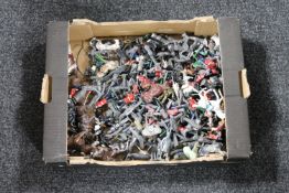 A box of metal figures,