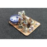A tray of blue and white bowl, porcelain bird figures,