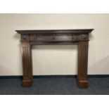 A reproduction oak fire surround