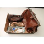 A box of brown leather hand bag, evening bags, costume jewellery,