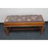 An oak framed tapestry seated duet stool