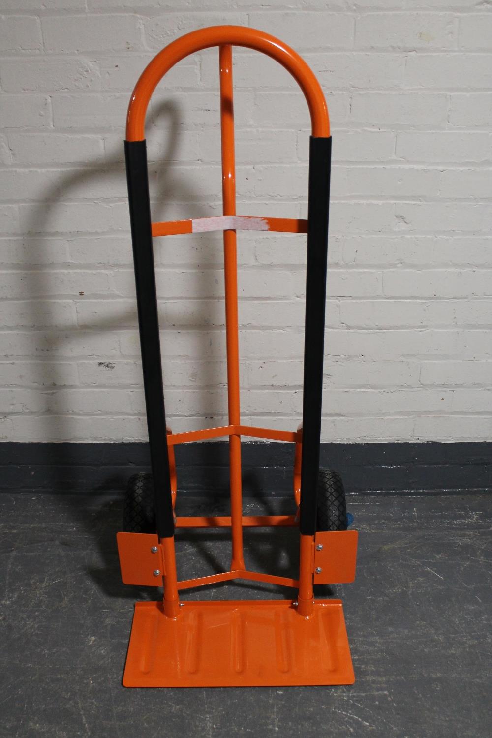 A heavy duty single handled sack barrow on spring axle