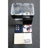 A box of miscellaneous commemorative coins and first day covers; Royalty, FA Cup,