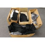 New stock : Four boxes of black trousers,