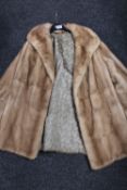 A light mink fur coat