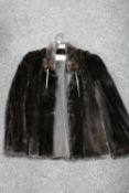 A dark brown mink fur coat