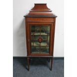 An Edwardian inlaid mahogany display cabinet