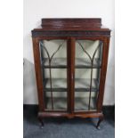 An Edwardian mahogany glazed display cabinet