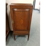 An Edwardian inlaid mahogany cabinet,