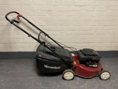 A Mountfield petrol lawn mower