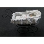 An antique style doll's pram