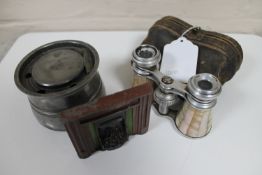 A small travelling inkwell, opera glasses in case,