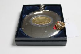 A 9ct gold dress ring and a silver plated hip flask