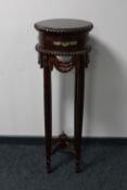 An ormolu mounted reproduction plant stand