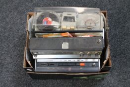 A box of vintage reel to reel player,
