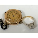 A 9ct gold cased wristwatch with Rolex movement and a 9ct gold solitaire dress ring