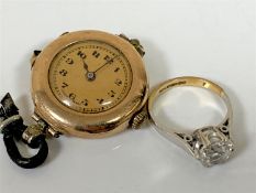 A 9ct gold cased wristwatch with Rolex movement and a 9ct gold solitaire dress ring