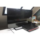 A Toshiba 48" LCD TV and a Baird TV screen