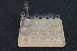 A tray of antique glass decanters and crystal
