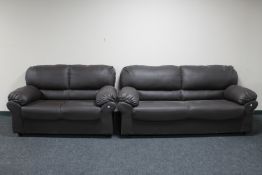 A brown stitched vinyl two seater and three seater settees