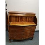 A reproduction inlaid cylinder bureau,