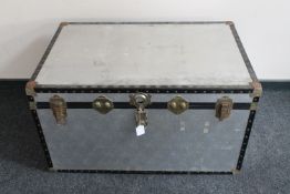 A metal storage trunk