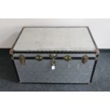 A metal storage trunk