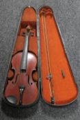 An antique French violin and bow, labelled Thiery a Paris,