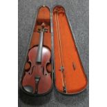 An antique French violin and bow, labelled Thiery a Paris,