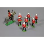 Seven Britiains painted lead British soldiers and a 2nd Dragoons Sergeant on horseback