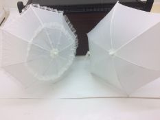 A box of white parasols