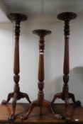 Three carved mahogany reproduction plant stands