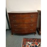 A George III bow fronted mahogany four drawer chest,