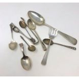 A Georgian silver table spoon, six other silver spoons,