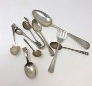A Georgian silver table spoon, six other silver spoons,